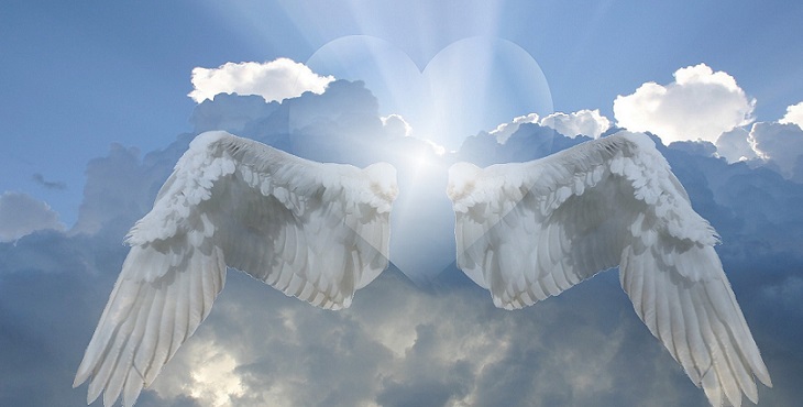 Image of angel wings in the sky with a heart in the middle. Earth Archive #7
