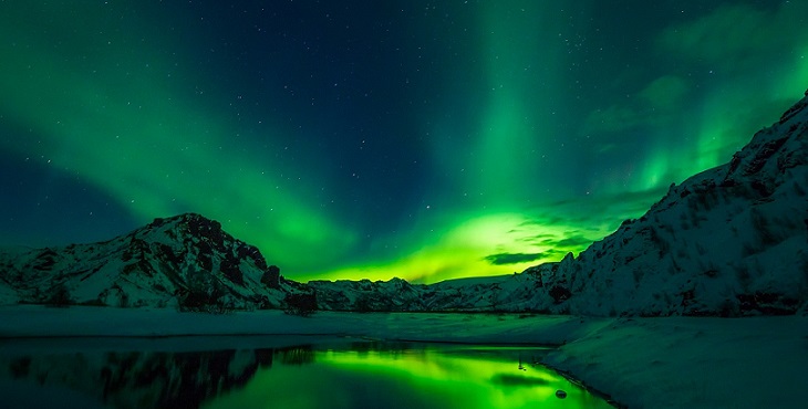 Image of the mesmerizing aurora borealis in amazing Iceland. Assertions for Light Boundaries