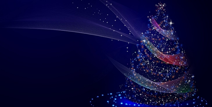 Image of a sparkling Christmas tree of rainbow lights. Holiday Blessings from Ancestor Faith